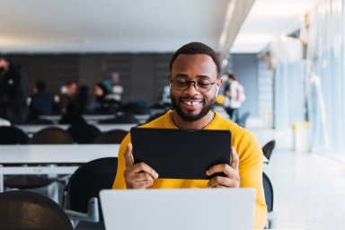 Happy Black Male Student Wearing Headphones Elearn 2024 12 05 21 10 13 Utc